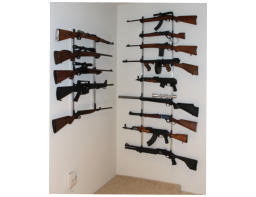 Stacked Adjustable Gun Rack on Right Showing 9 Different Guns